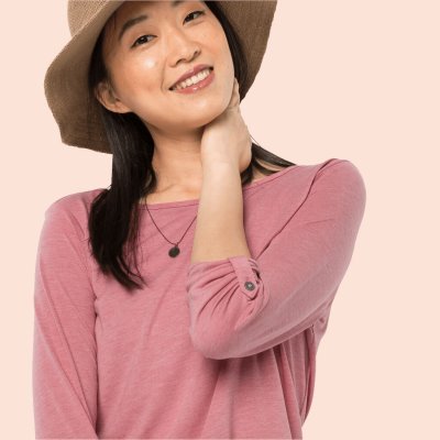 Ärmarna kan fästas upp.