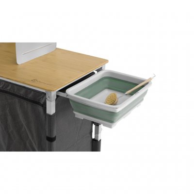 Köksbordet har en utdragbar hållare för diskbalja eller soppåse