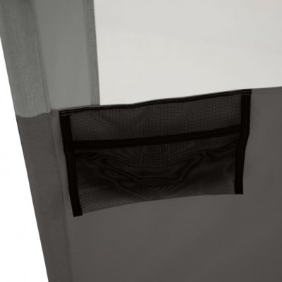 Förvaringsficka på baksidan av vindskyddet.